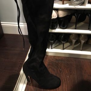 Over the knee lace up boots with rose gold accents